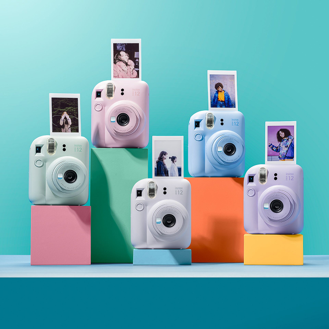 Photograph of a wedding couple on a vintage bus by Emily Renier