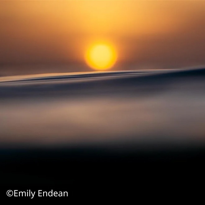 Photograph of a sunset over the sea by Emily Endean